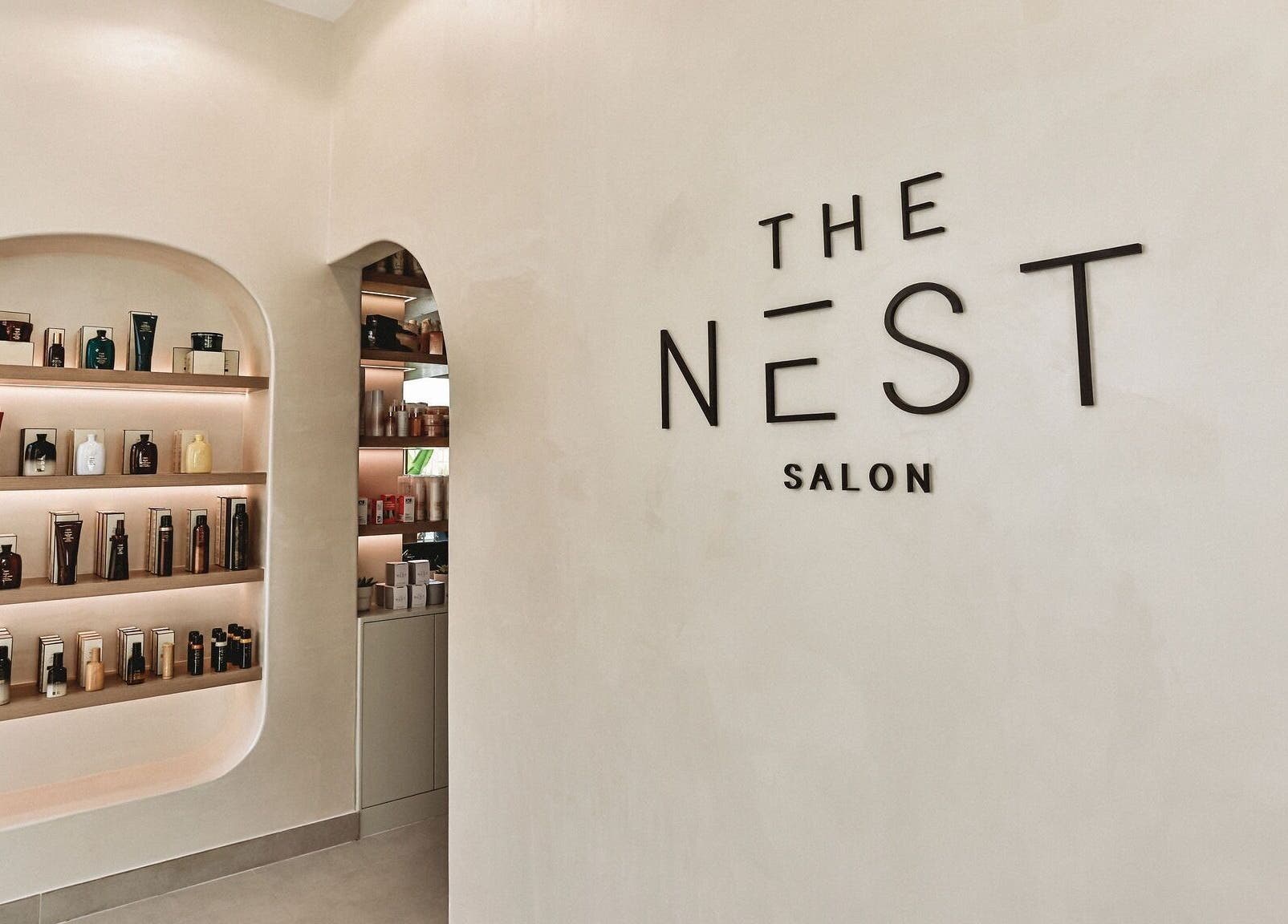 Sleek and modern product display at The Nest Hair Salon, Jumeirah, Dubai, AE, highlighting beauty essentials.