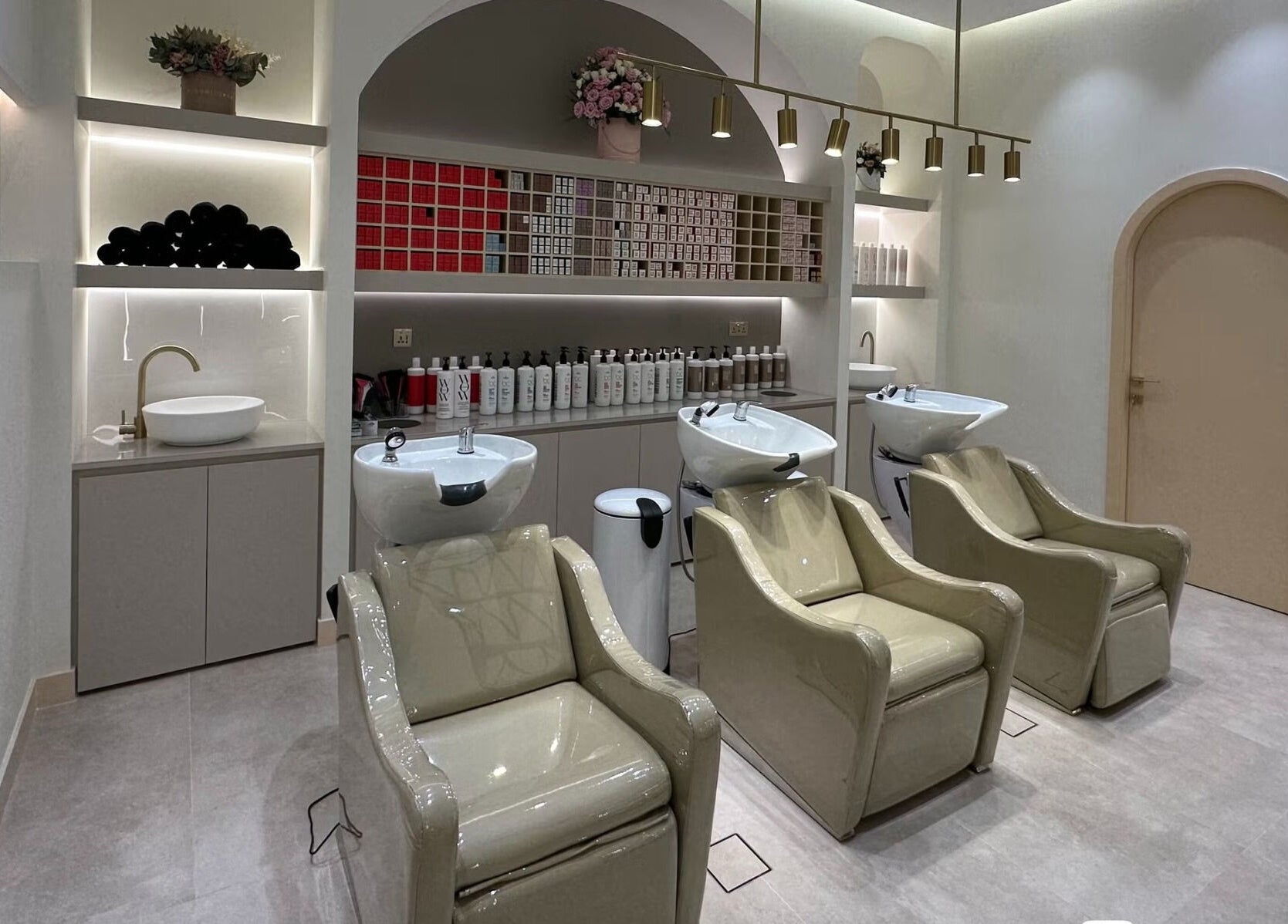 Elegant wash stations at The Nest Salon, Sobha Hartland, دبي, Dubai, AE, offering a tranquil beauty escape.