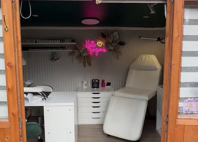 Interior of Ballerina Beauty, Leeds, England, featuring chic decor and treatment chair.