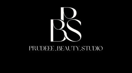 Prudeee.Beauty.Studio logo in Akasia, Gauteng, ZA. Chic design on a dark background.