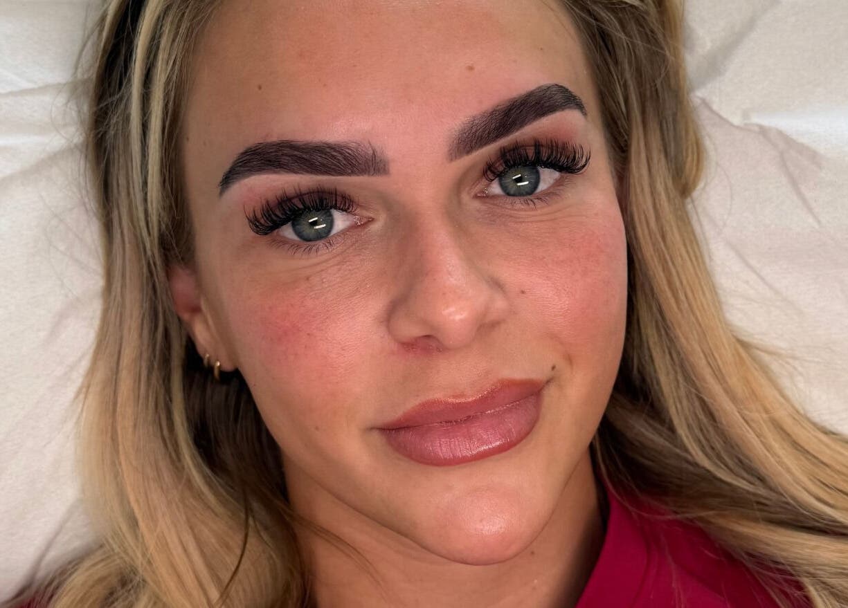 Client with enhanced eyebrows and lashes at Making Beauty, Maldon, England, GB.