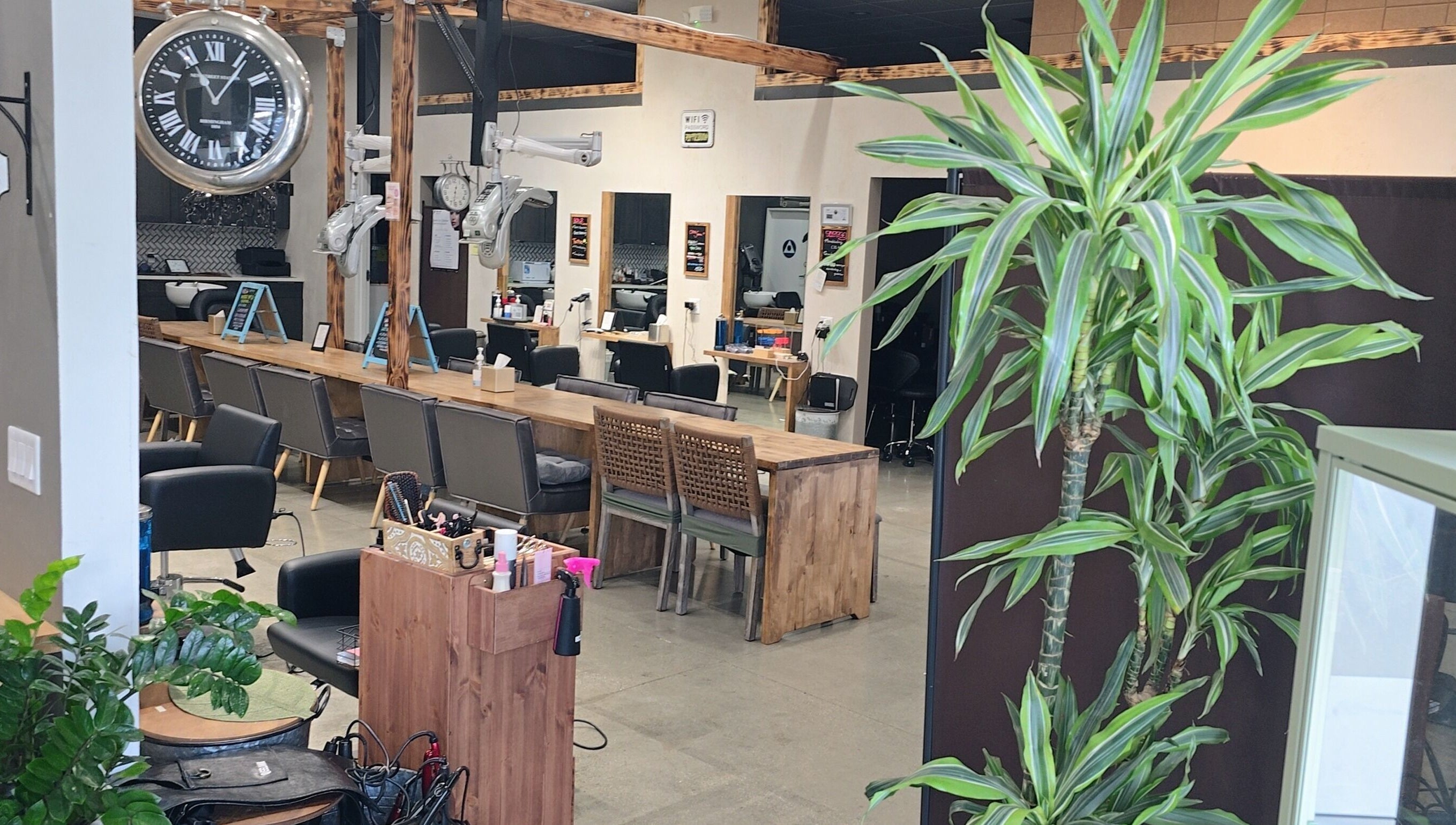 Elegant interior of Elle Hair Salon in La Habra, California, US featuring stylish chairs and decor.