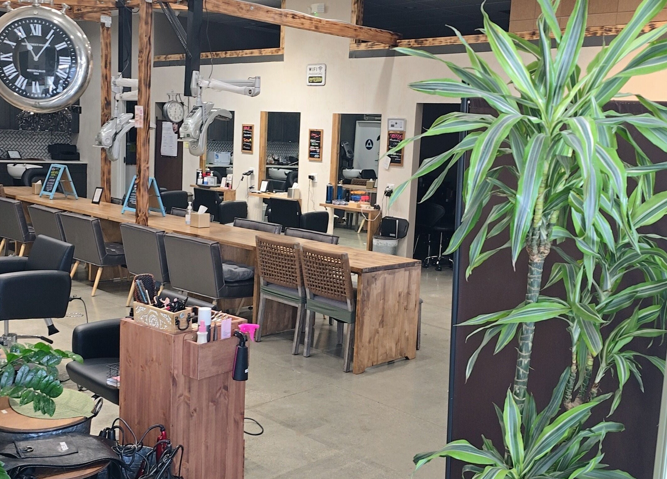 Elegant interior of Elle Hair Salon in La Habra, California, US featuring stylish chairs and decor.
