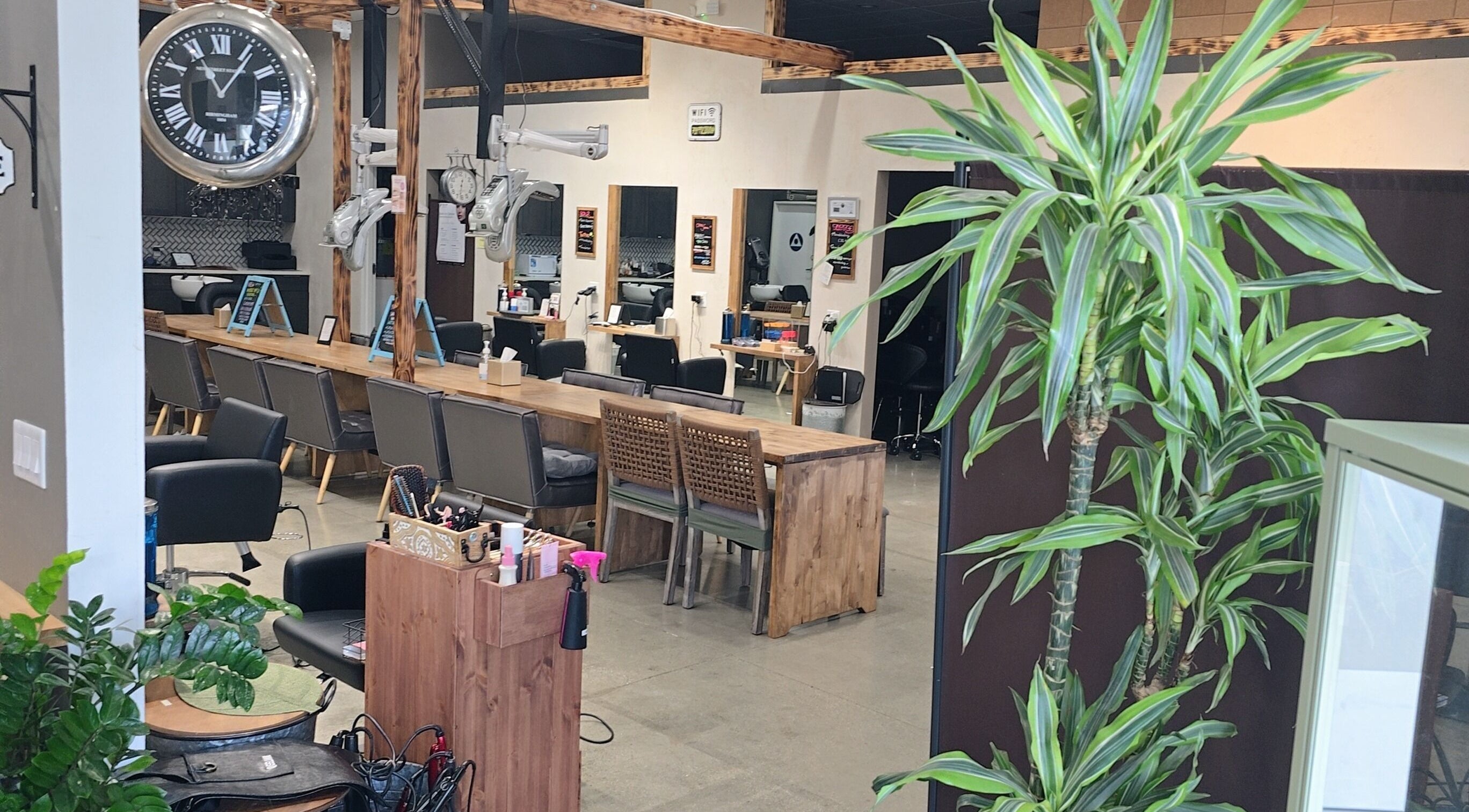 Elegant interior of Elle Hair Salon in La Habra, California, US featuring stylish chairs and decor.