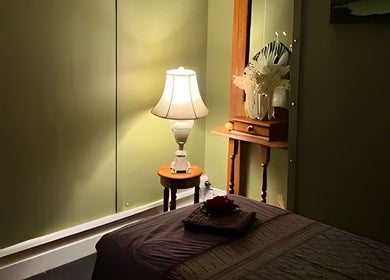 Cozy massage room at Nina Thai & Remedial Massage in Melbourne, Victoria, AU with soft lighting and calming decor.