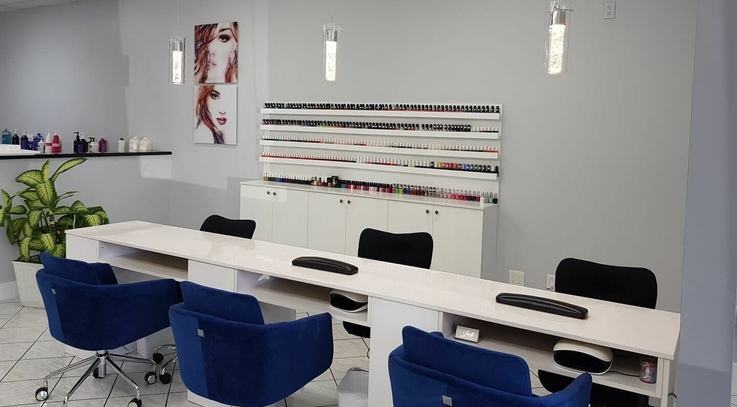 Modern manicure station at Look by Mariela Taratuta, Dania Beach, Florida, US, showcasing nail polish collection.
