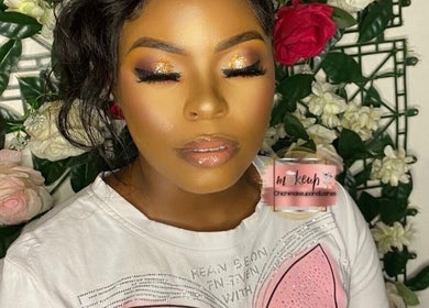 Chichimakeupandlashes enhances beauty in Johannesburg, Gauteng, ZA with elegant makeup against a floral backdrop.