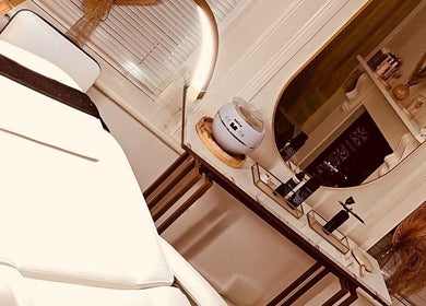 Luxurious treatment room at Theglow by CLS, Batley, England, GB, showcasing a stylish and tranquil setting.
