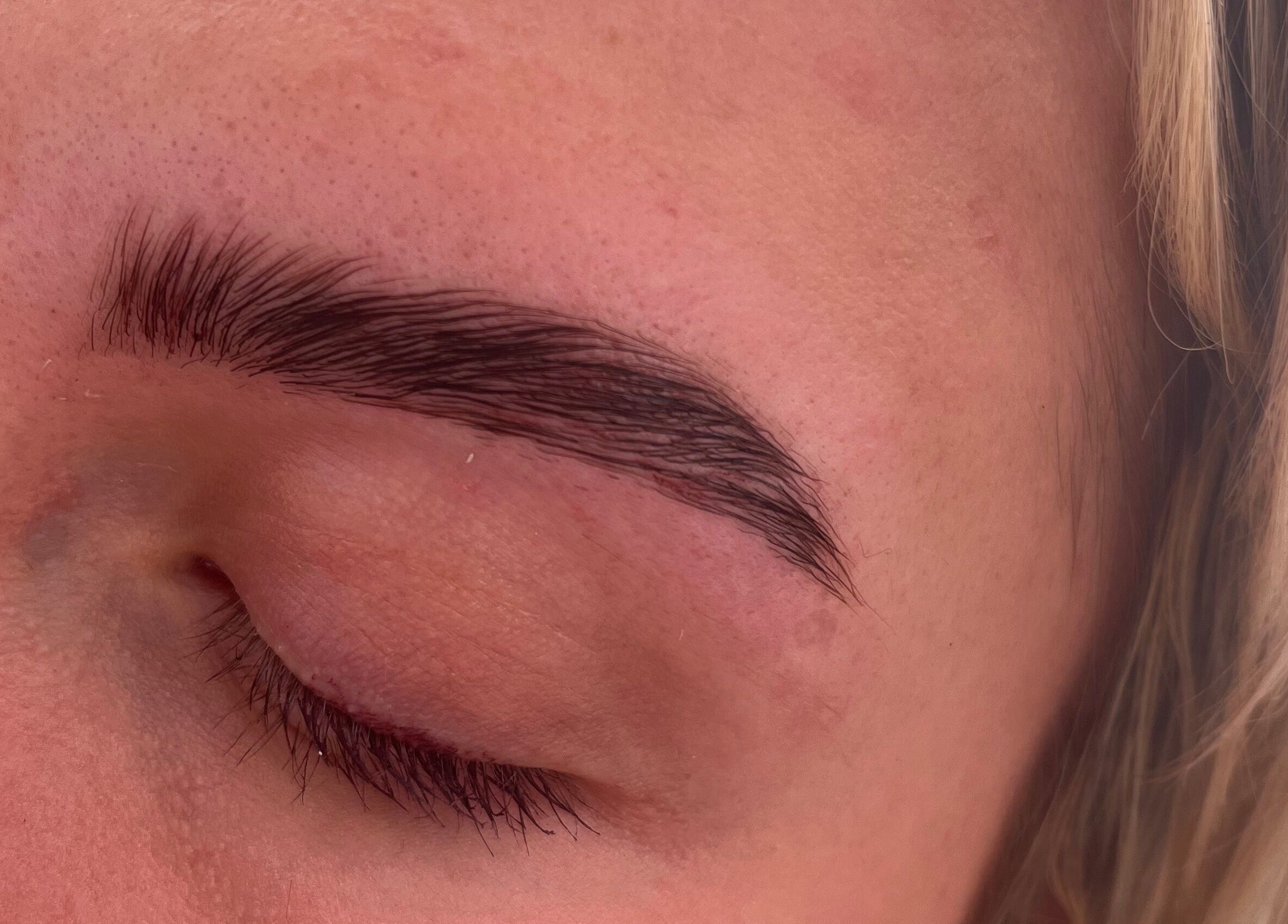 Close-up of well-groomed eyebrow at Natural Aesthetics in Stoke-on-Trent, England, GB.
