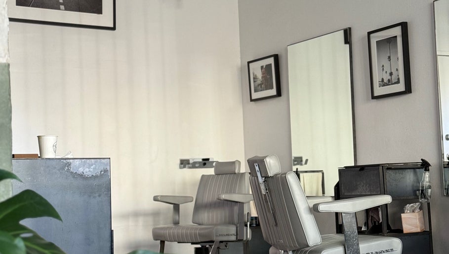Chic barber chair at Brother Wolf St Kilda, Melbourne, Victoria, AU. Minimalist design for a premium experience.