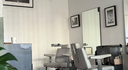Chic barber chair at Brother Wolf St Kilda, Melbourne, Victoria, AU. Minimalist design for a premium experience.