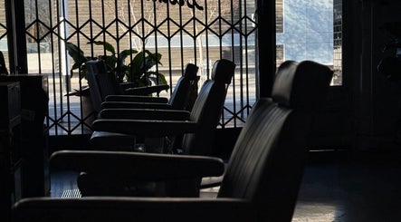 Sleek barber chairs at Brother Wolf St Kilda, Melbourne, Victoria, AU. Modern salon design.