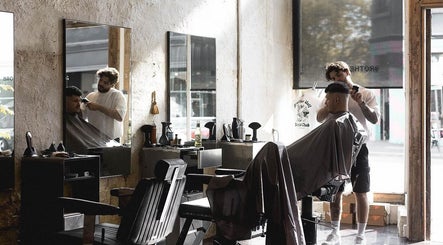 Stylish interior of Brother Wolf Fitzroy, Melbourne, Victoria, AU, showcasing expert barbering services.