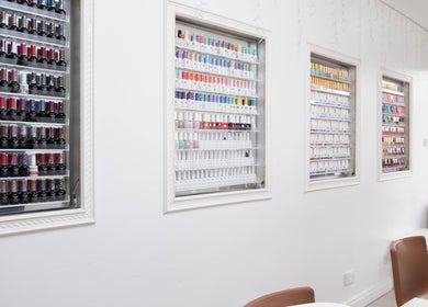 Colorful nail polish display at Brick Lane Nail Spa in London, England, GB.