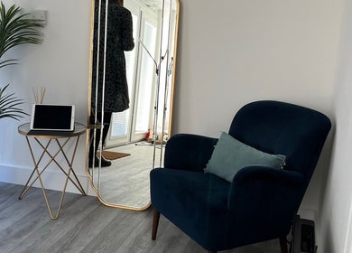 Stylish corner with mirror and chair at Nurse Injector Michelle, Lowestoft, England, GB.