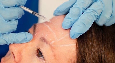 Nurse Injector Michelle performing a forehead injection at Lowestoft, England, GB wellness venue.