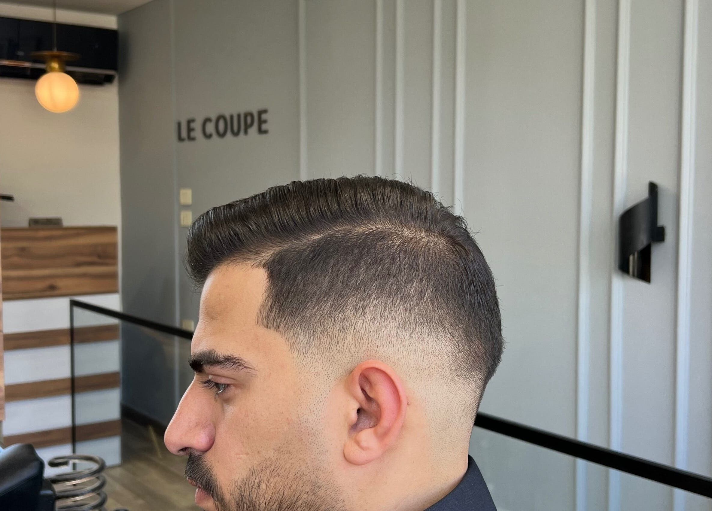 Modern haircut at Le Coupe 3, عمّان, محافظة العاصمة, JO. Stylish and professional hair grooming service.