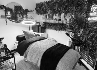 Sie Skin Spa treatment room with cozy decor and ambient lighting in Stalybridge, England, GB.