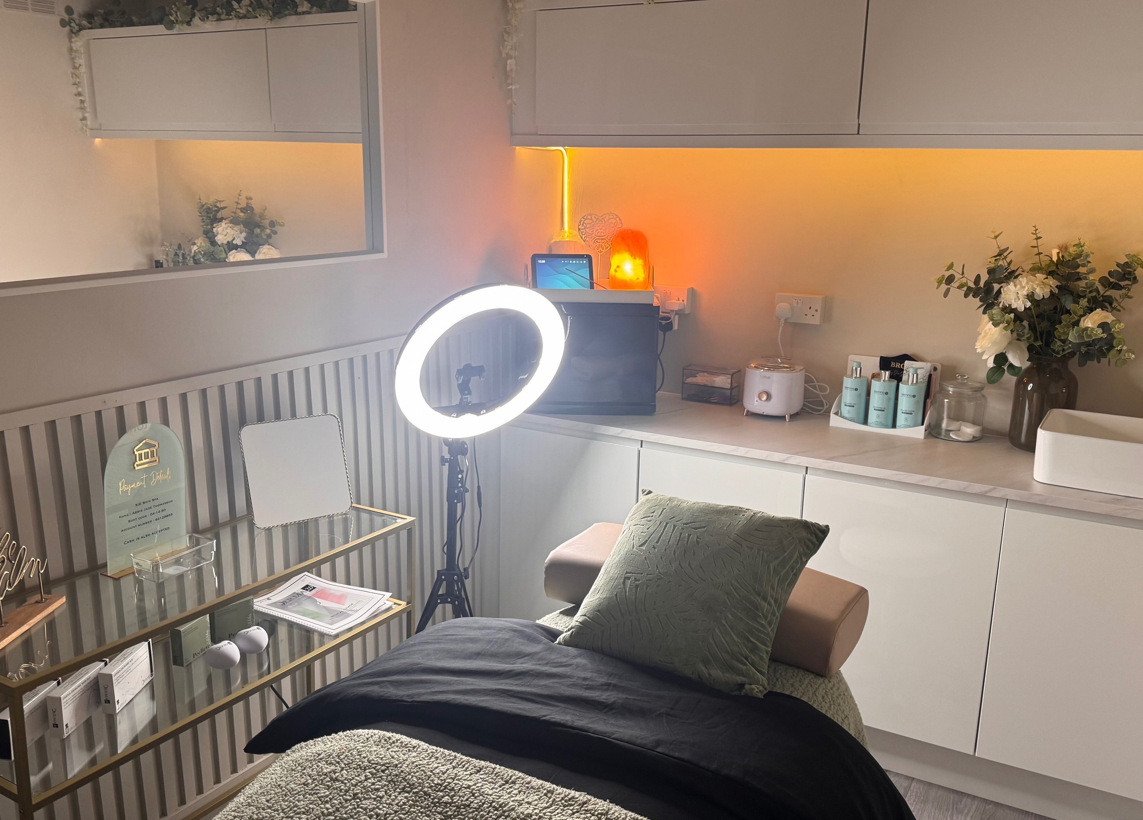 Modern beauty treatment room at Sie Skin Spa, Stalybridge, England, GB with elegant decor and warm lighting.