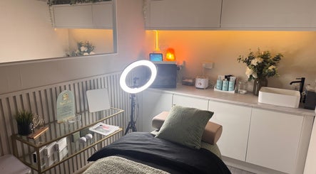 Modern beauty treatment room at Sie Skin Spa, Stalybridge, England, GB with elegant decor and warm lighting.