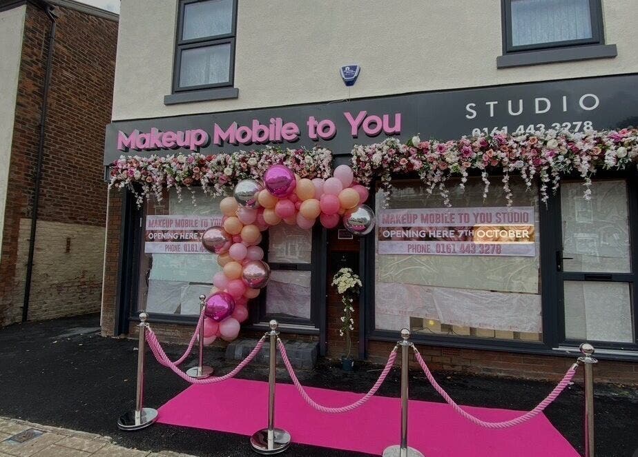 Chic entrance of Makeup Mobile To You Studio in Stockport, England, GB, adorned with vibrant pink decor.