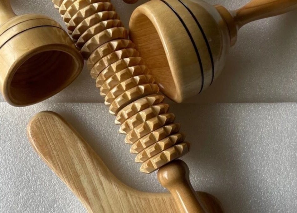 Wooden massage tools at Blonde Gypsy Tanning in Belmore, New South Wales, AU offer a natural wellness experience.