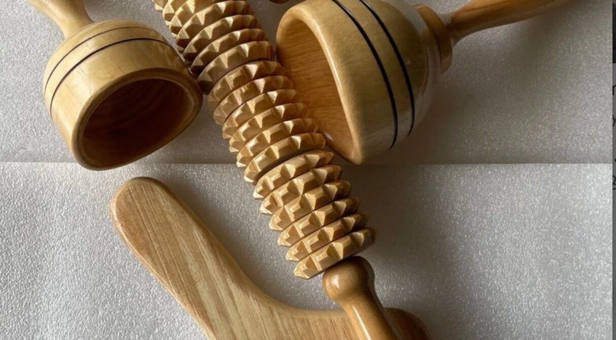 Wooden massage tools at Blonde Gypsy Tanning in Belmore, New South Wales, AU offer a natural wellness experience.