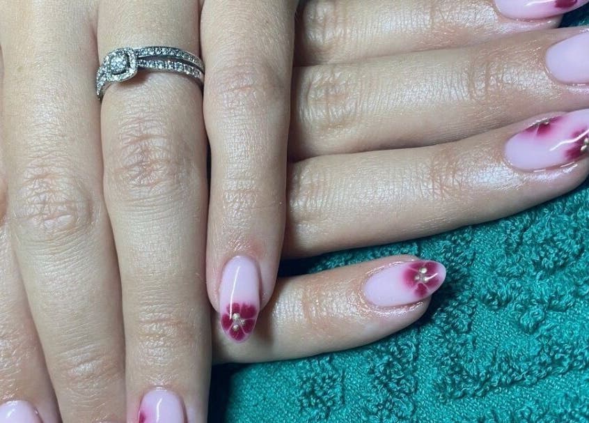 Elegant floral nail art at ALM Beauty, Brighton And Hove, England, GB.