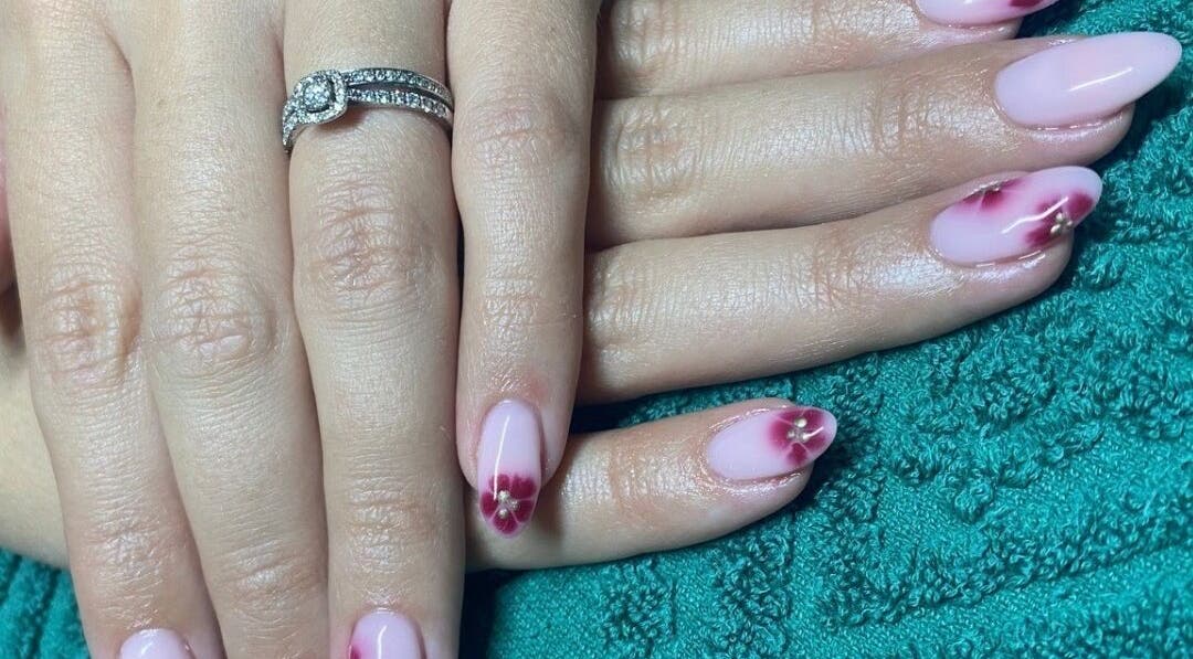 Elegant floral nail art at ALM Beauty, Brighton And Hove, England, GB.