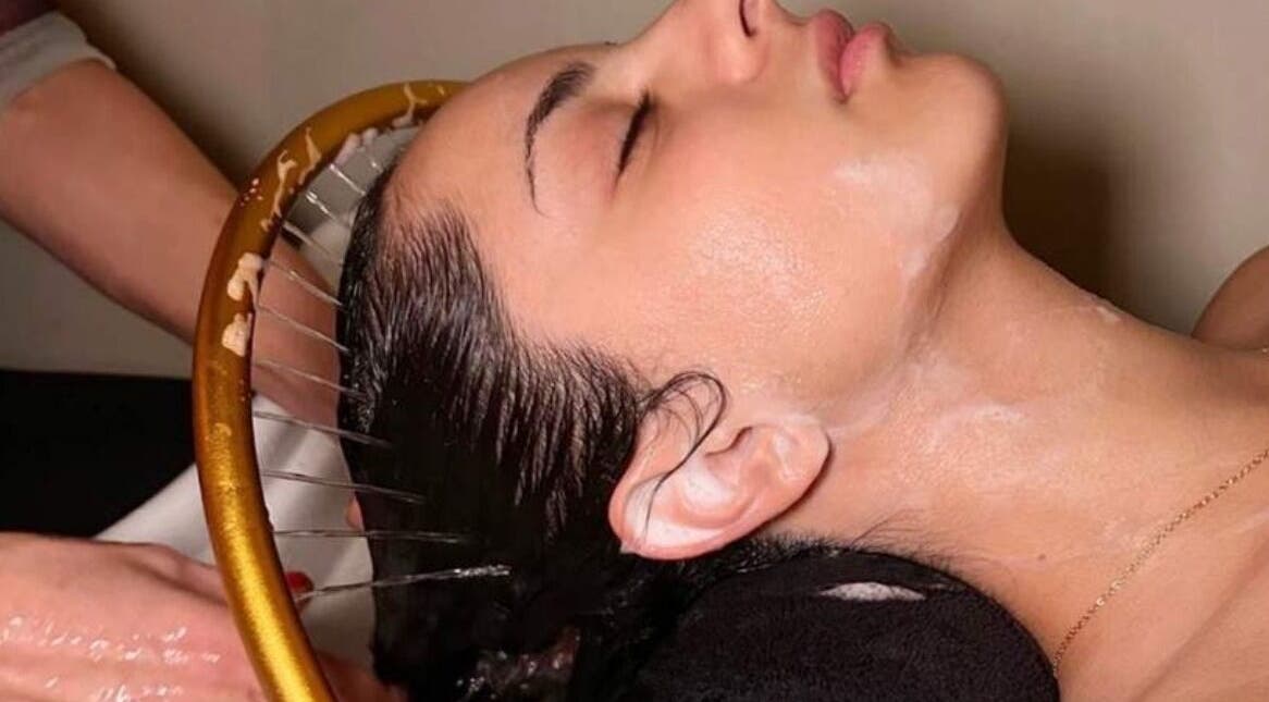 Relaxing head spa treatment at Nami Head Spa in draycott, England, GB, highlighting soothing water session.