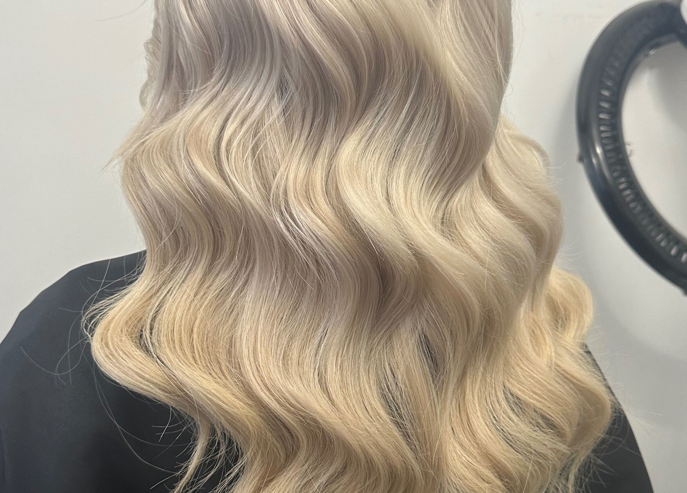 Stylish blonde waves created at Lush Hair and Nails, Stockton on Tees, England, GB.
