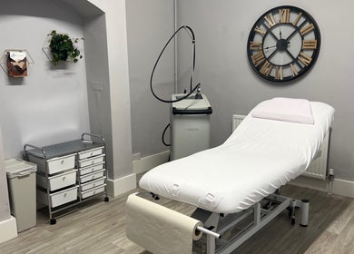 Therapy room at The London Road Clinic, Newark-on-Trent, England, featuring a treatment bed and equipment.