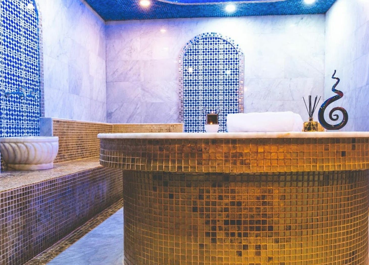 Luxurious Hamam at Alafiya Center for Hamam & Saloon, Abu Dhabi, AE, featuring elegant mosaic decor.