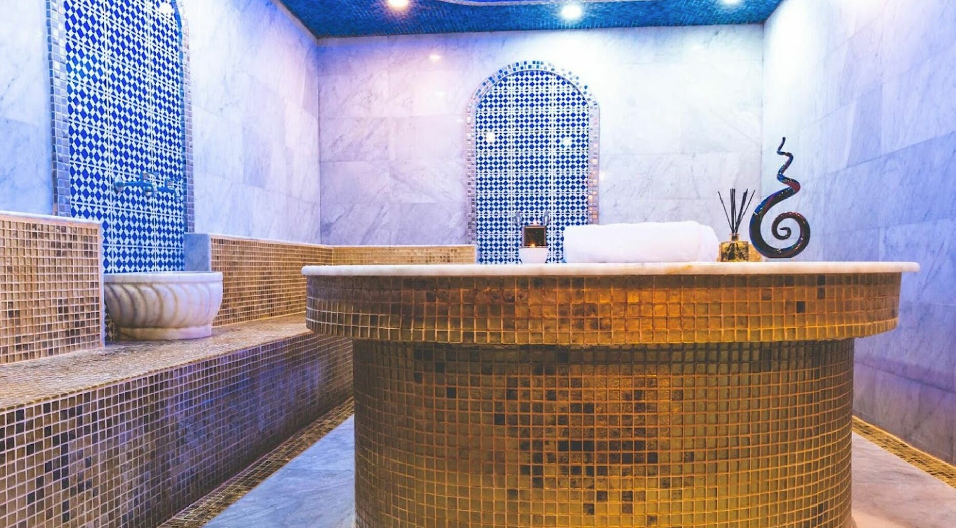 Luxurious Hamam at Alafiya Center for Hamam & Saloon, Abu Dhabi, AE, featuring elegant mosaic decor.