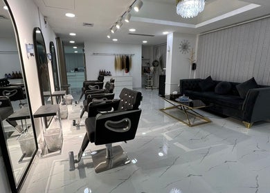 Luxurious beauty area at Faina Ladies Salon, أبو ظبي, أبو ظبي, AE, featuring chic chairs and stylish decor.