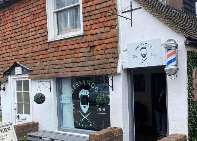 Exterior view of Herkymoo Herstmonceux, a traditional barbershop in Herstmonceux, England, GB.