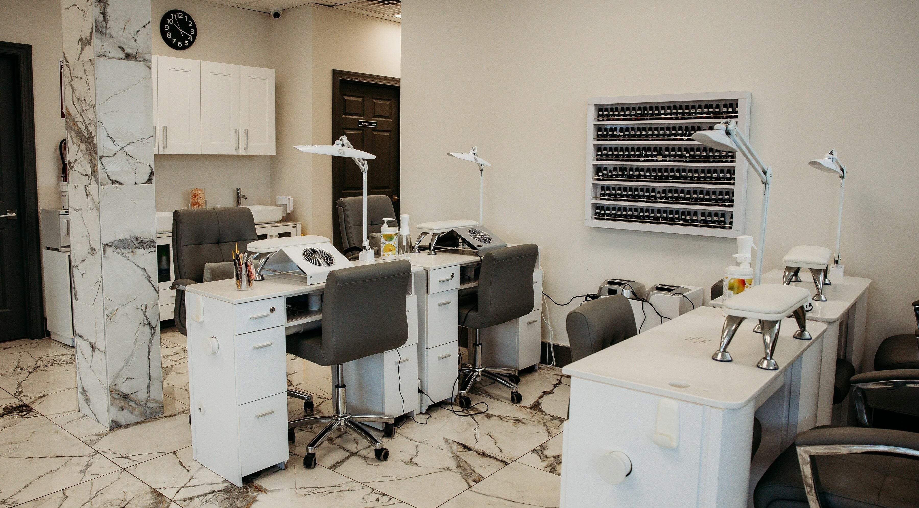 Modern nail salon interior at Oceanfront - Vogue Lashes and Spa, Virginia Beach, Virginia, US.