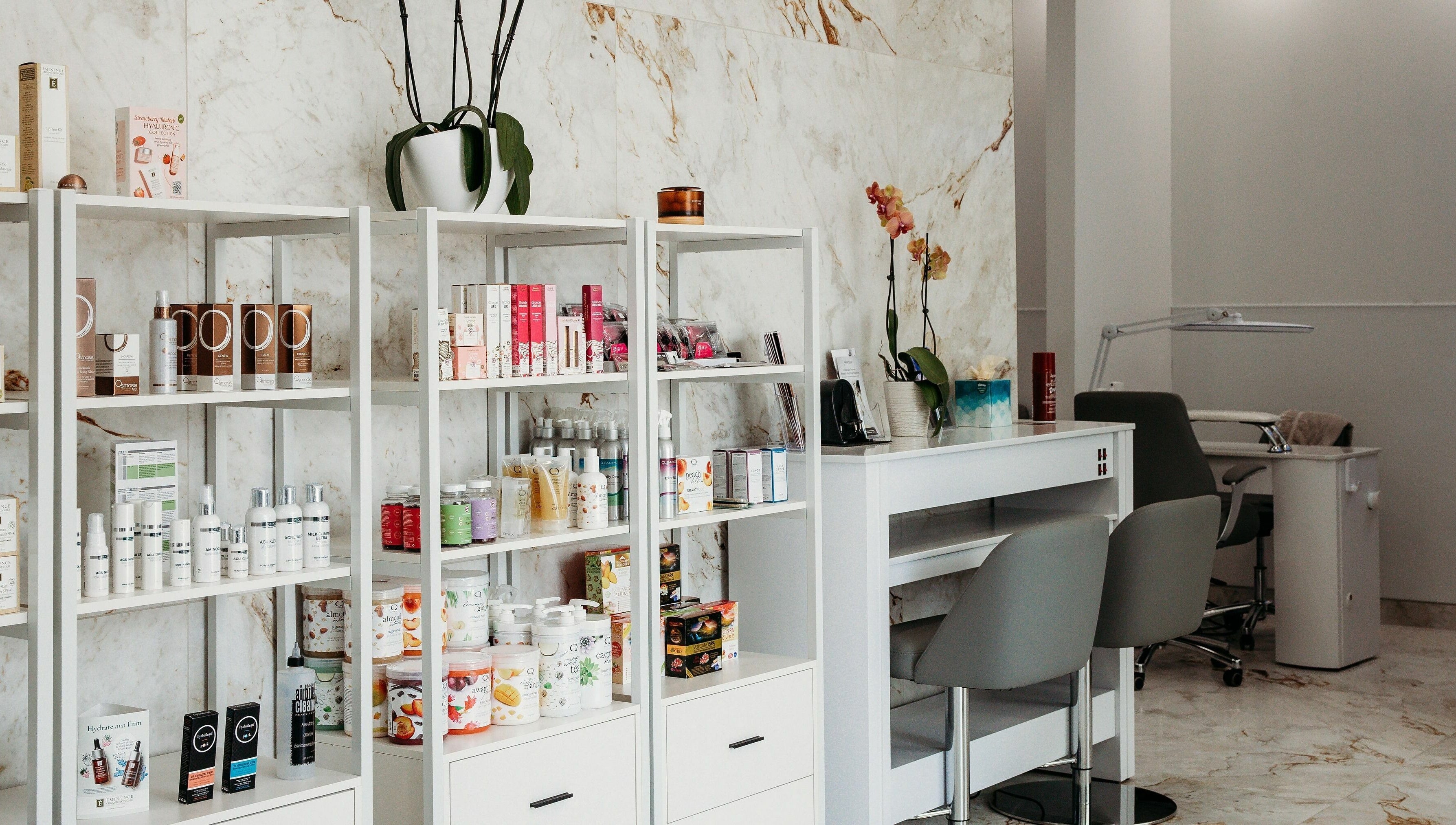 Elegant product shelves at At Marina Shores - Vogue Lashes and Spa, Virginia Beach, Virginia, US.