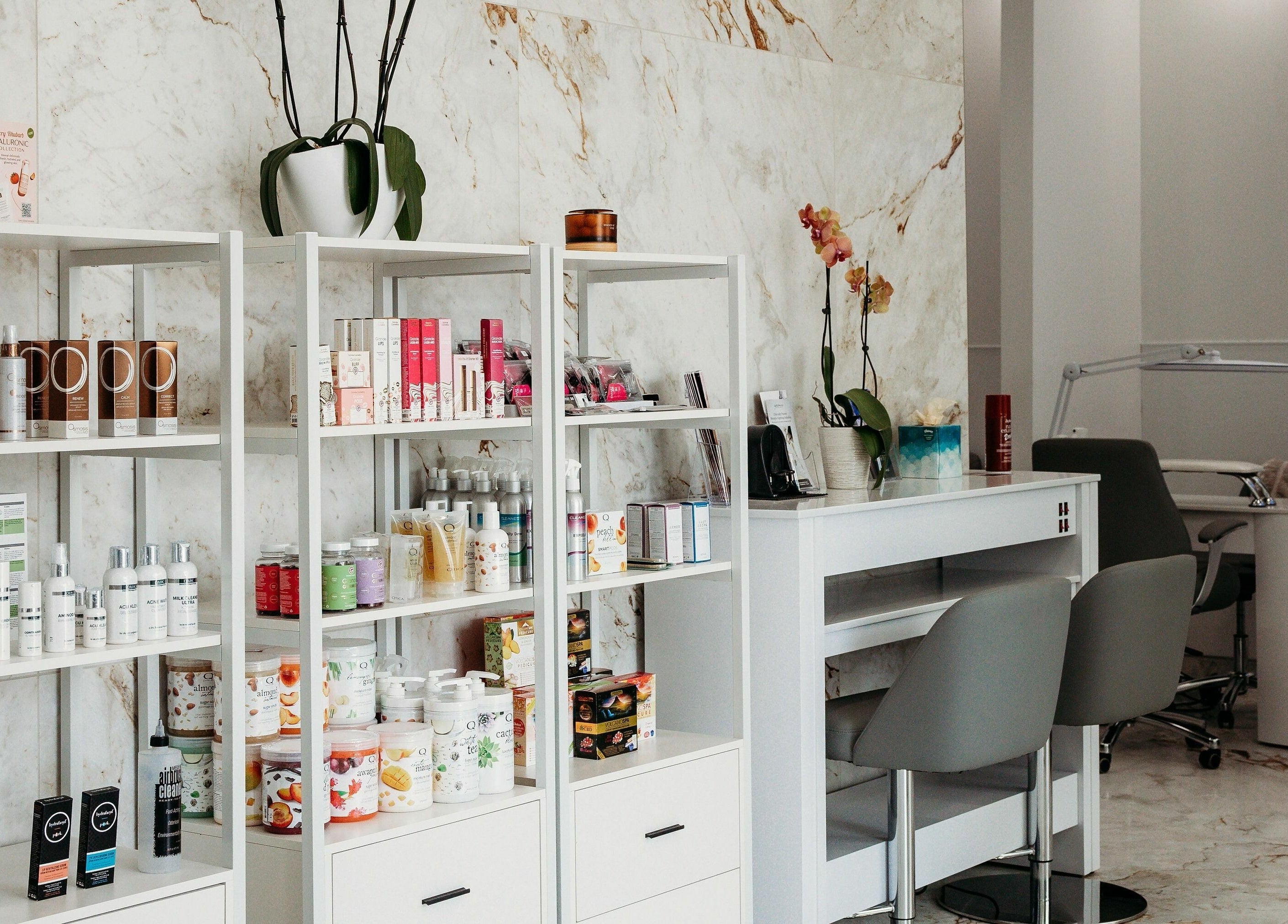 Elegant product shelves at At Marina Shores - Vogue Lashes and Spa, Virginia Beach, Virginia, US.