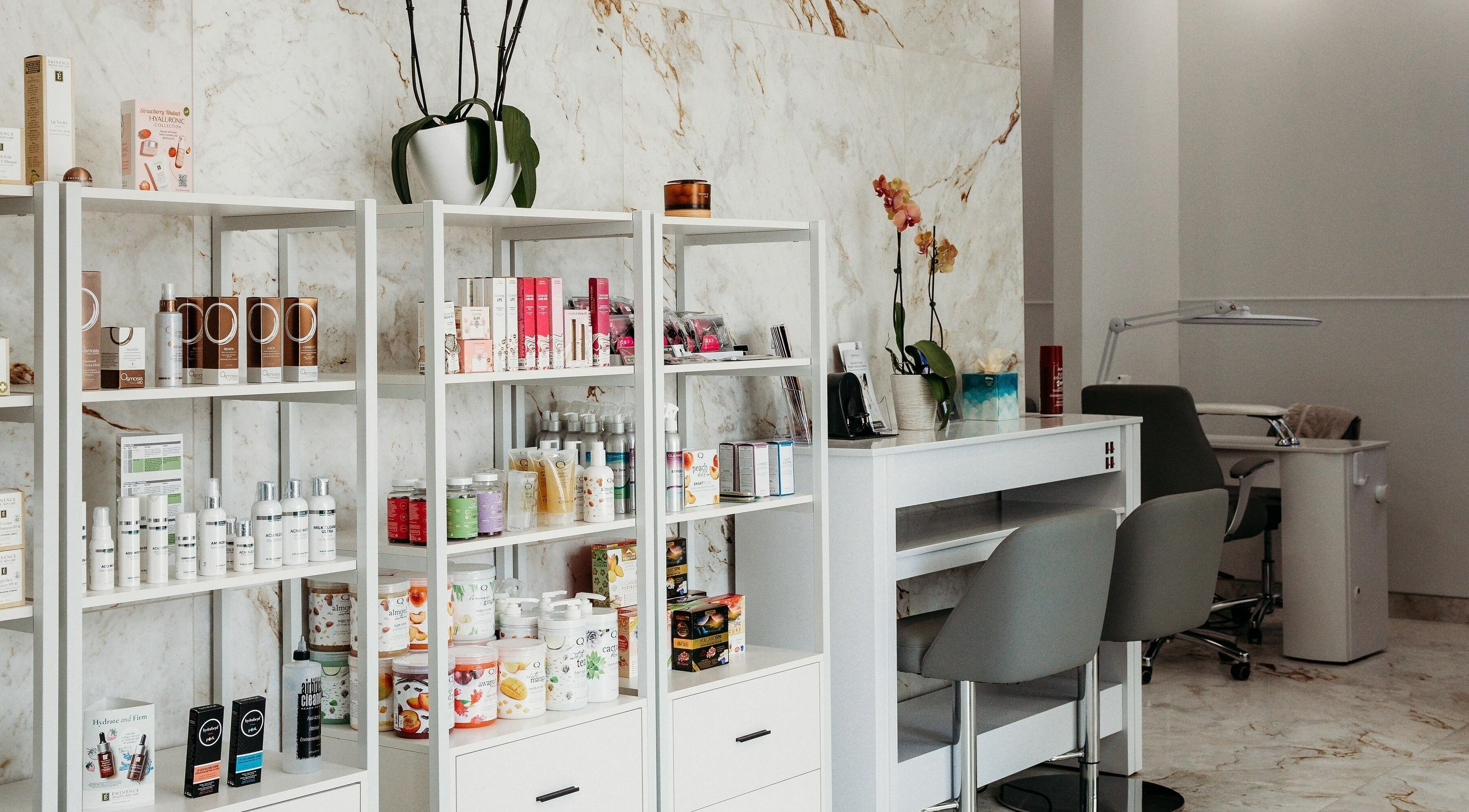 Elegant product shelves at At Marina Shores - Vogue Lashes and Spa, Virginia Beach, Virginia, US.