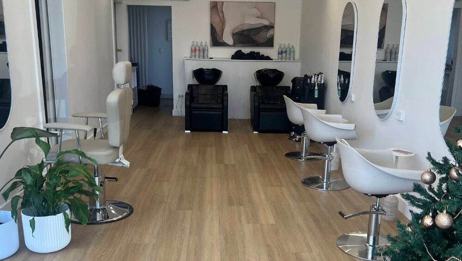 Interior of Beths Beauty Services in Morphett Vale, South Australia, AU featuring stylish salon chairs and mirrors.