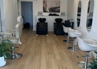 Interior of Beths Beauty Services in Morphett Vale, South Australia, AU featuring stylish salon chairs and mirrors.