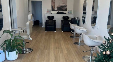 Interior of Beths Beauty Services in Morphett Vale, South Australia, AU featuring stylish salon chairs and mirrors.