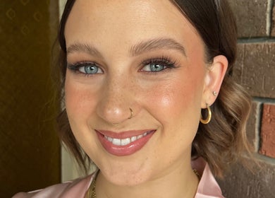 Smiling woman with elegant makeup at Beths Beauty Services, Morphett Vale, South Australia, AU.