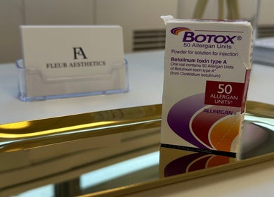 Box of Botox at Fleur Aesthetics - East London Clinic, Barking, England, GB, on a gold tray.