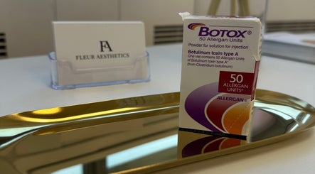 Box of Botox at Fleur Aesthetics - East London Clinic, Barking, England, GB, on a gold tray.