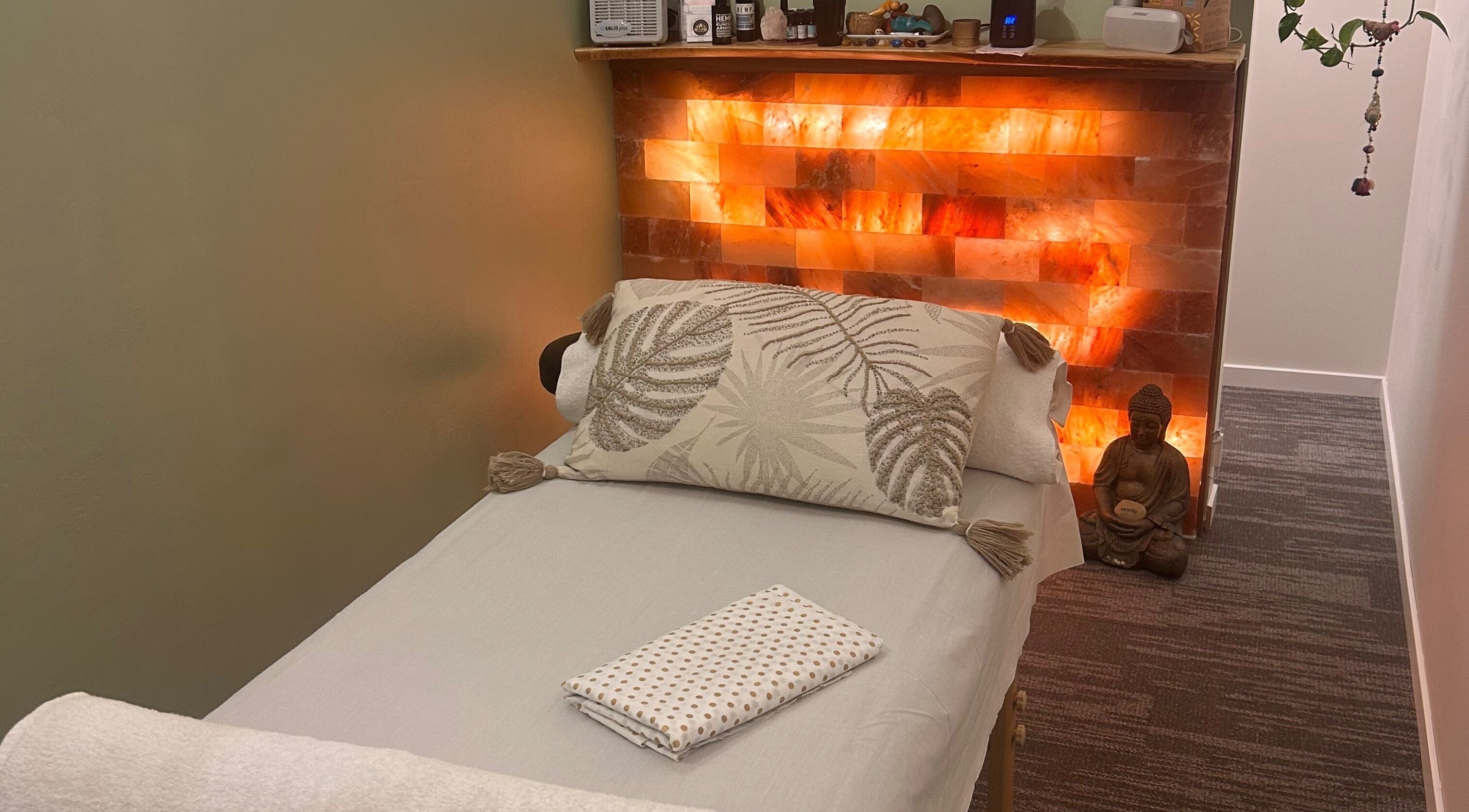 Relaxing massage room at Zenigma Massage and Wellness Gold Coast, Main Beach, Queensland, AU with calming decor.