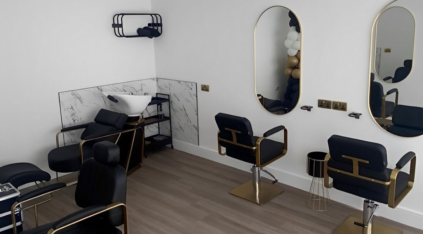 Elegant salon setup at Elite Beauty in Borrowash, England, GB featuring stylish chairs and modern decor.