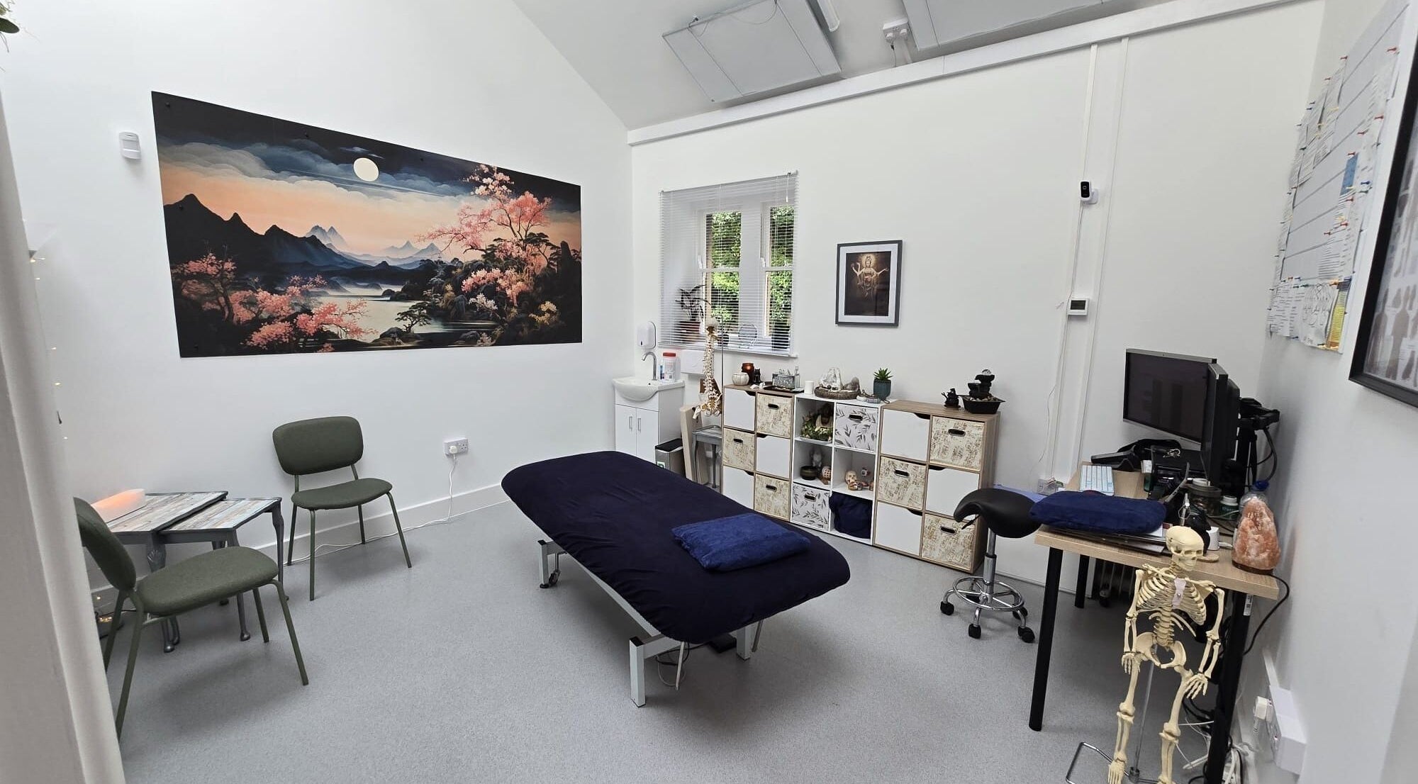 Amatsu Clinic, Acupuncture & Ozone Therapy in Abergavenny, Wales, offers a serene treatment room with calming decor.