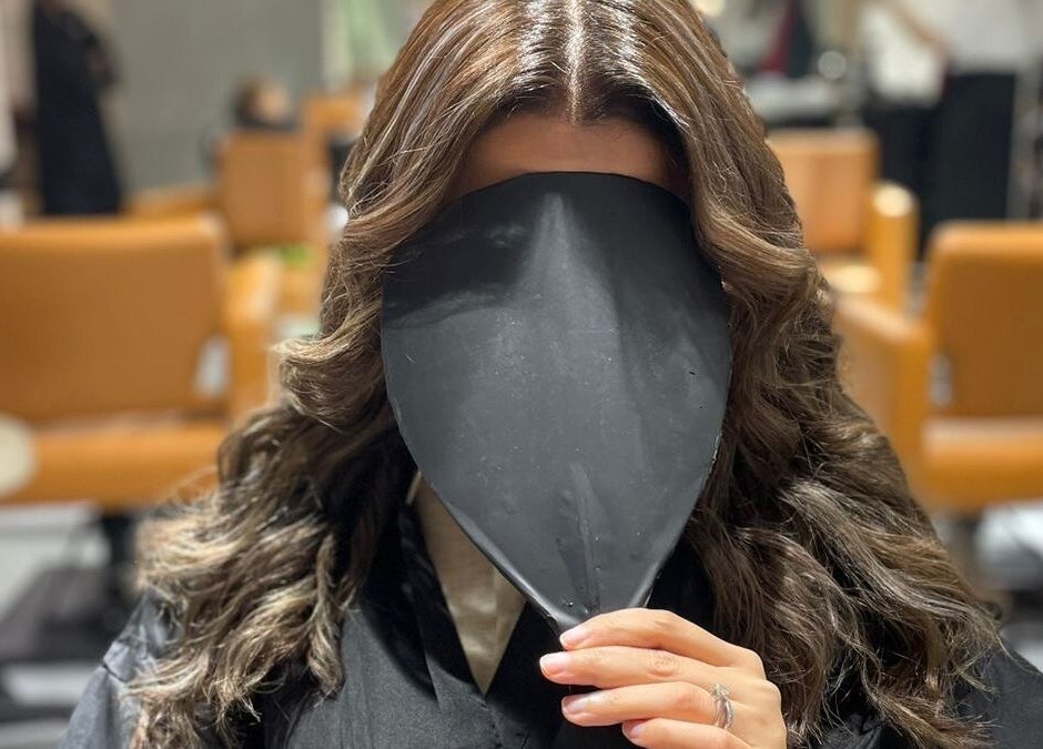 Stylish woman with wavy hair at Polished salon in Al Khobar, Eastern Province, SA.